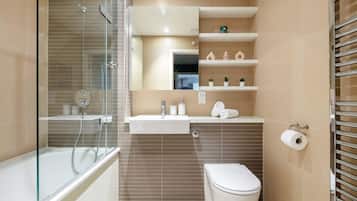 Shower, hair dryer, towels, shampoo