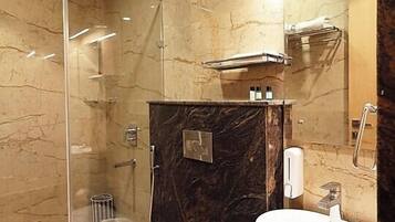 Shower, rainfall showerhead, towels, soap