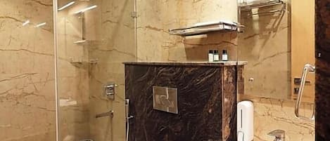 Shower, rainfall showerhead, slippers, towels