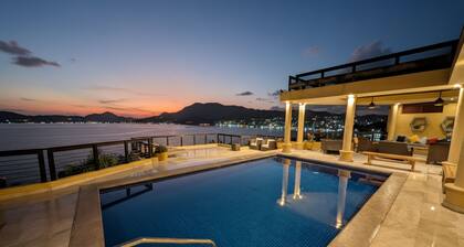 Clifftop Luxury: 180° Ocean Views, Private Pool, Beach Access, Sleeps 12