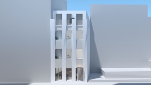 A modern building with a central atrium, multiple floors, and a staircase leading to the entrance. - Milioni by Oniro (Athens)