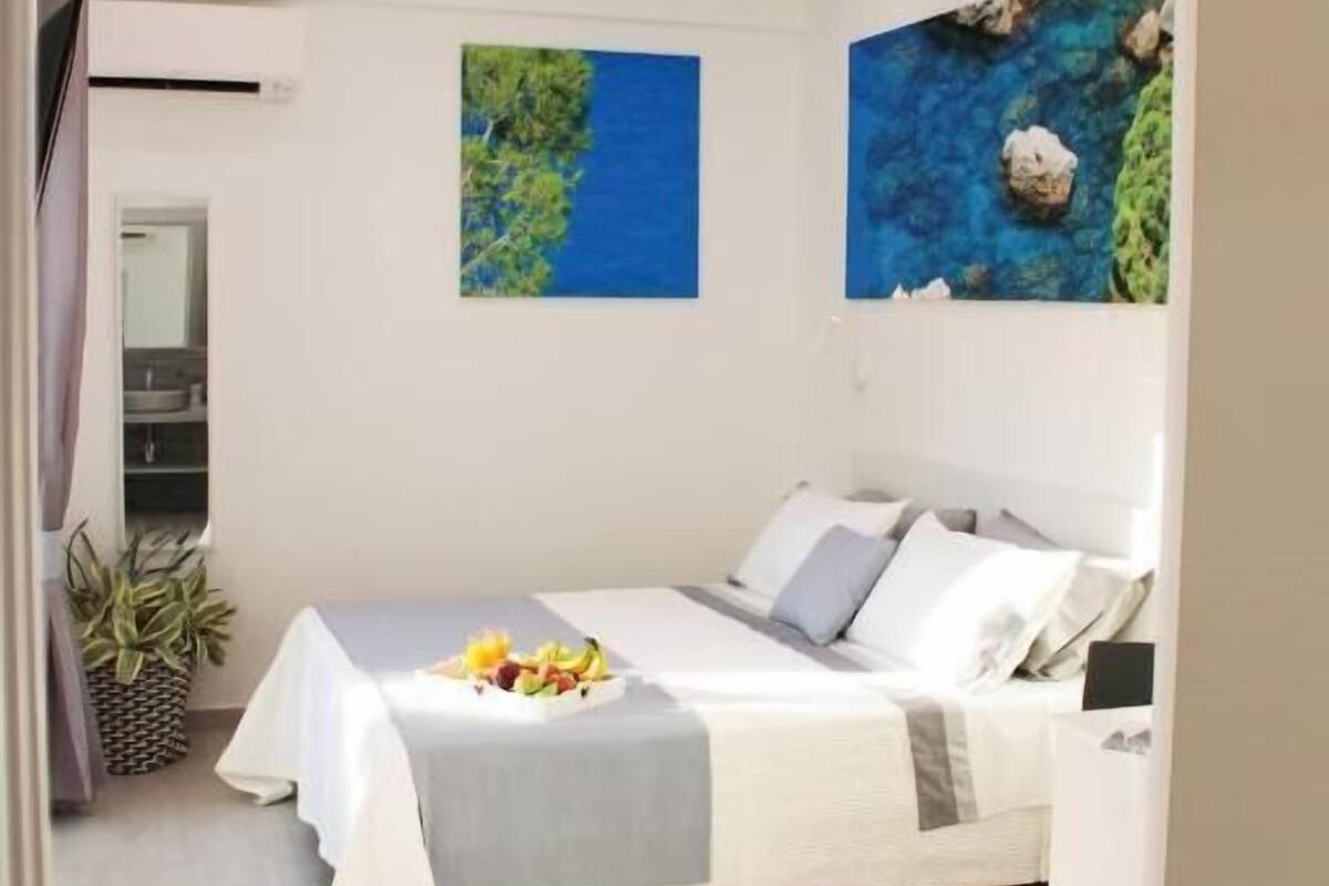 Habitación exclusiva doble, vistas al jardín | Caja fuerte, tabla de planchar con plancha, wifi gratis