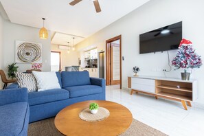 Deluxe Apartment, Pool View | Living area | 55-inch plasma TV with digital channels - Quiet 1BR Apartment Walk to Bávaro Beach (Punta Cana)