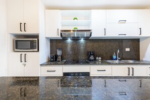 Deluxe Apartment, Pool View | Private kitchen | Coffee/tea maker, blender, dining tables - Quiet 1BR Apartment Walk to Bávaro Beach (Punta Cana)