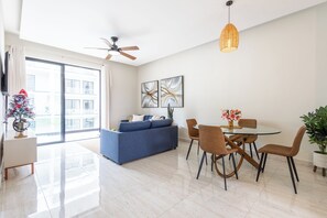 Deluxe Apartment, Pool View | Living area | 55-inch plasma TV with digital channels - Quiet 1BR Apartment Walk to Bávaro Beach (Punta Cana)