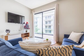 Deluxe Apartment, Pool View | Living area | 55-inch plasma TV with digital channels - Quiet 1BR Apartment Walk to Bávaro Beach (Punta Cana)