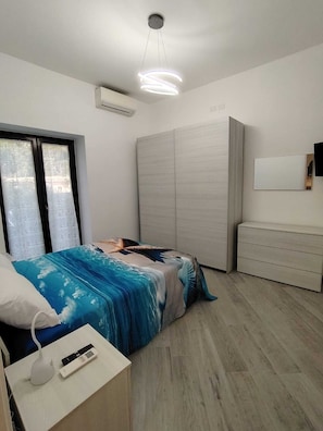 2 chambres, fer et planche à repasser, Wi-Fi, draps fournis