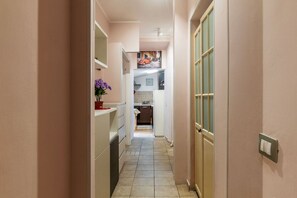 Interior - GuestHost - A comfortable and spacious 105 square meters apartment, perfect for six people, located on the ground floor of a renovated building.The property is located in the San Giovanni neighborhood, just a 12-minute bus ride from the Colosseum. The me (Rome)