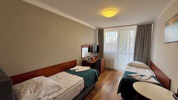 Desk, laptop workspace, blackout curtains, iron/ironing board