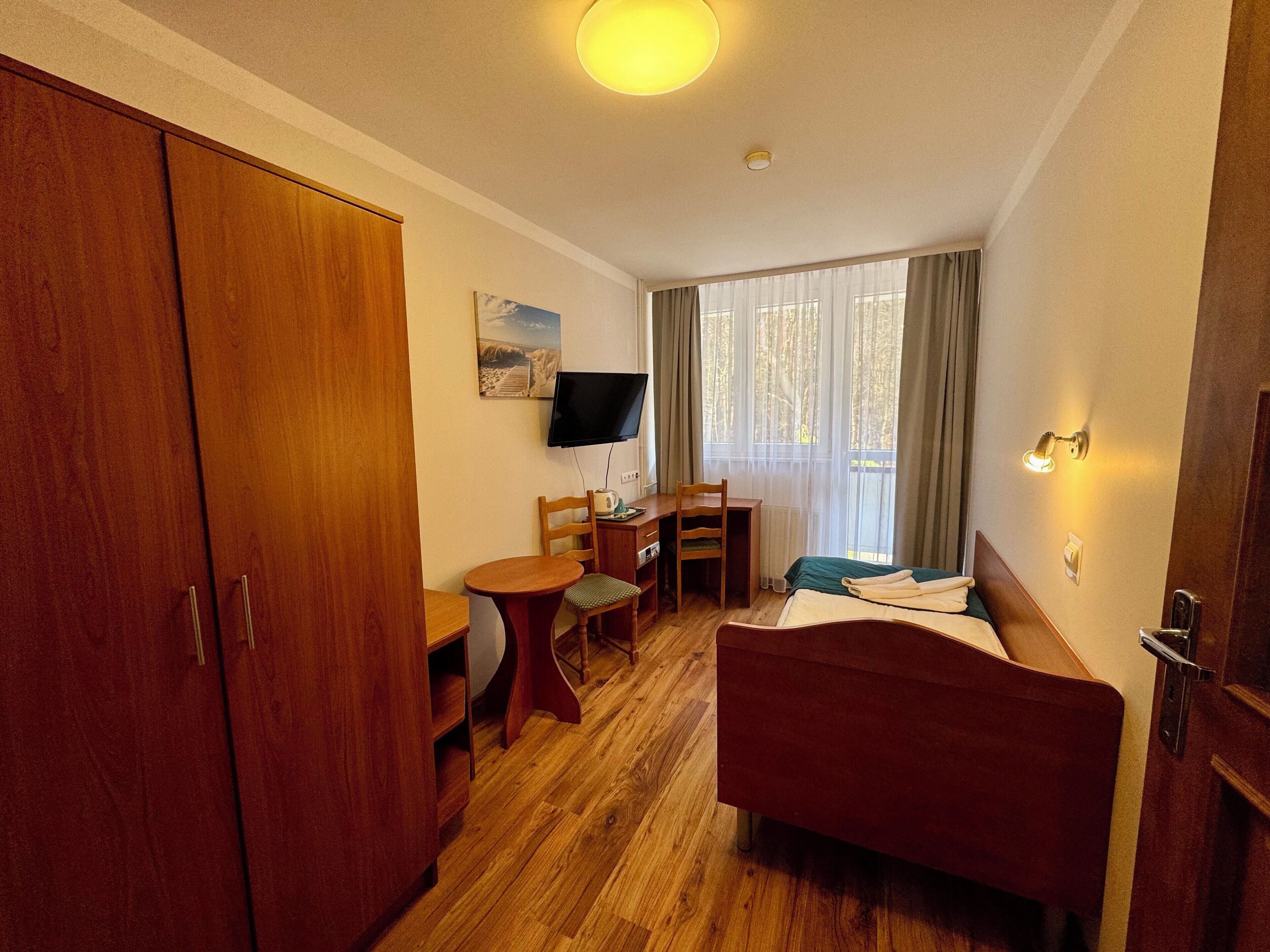 Classic Single Room, Balcony, Park View | Desk, laptop workspace, blackout drapes, iron/ironing board