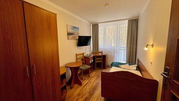 Classic Single Room, Balcony, Park View | Desk, laptop workspace, blackout drapes, iron/ironing board