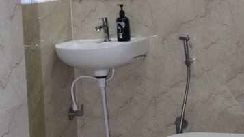 Shower, bidet, towels, soap