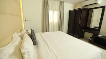 Habitación individual | Caja fuerte, cortinas opacas, sistema de insonorización