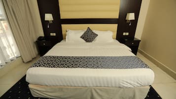 Basic Suite | In-room safe, blackout drapes, soundproofing, iron/ironing board