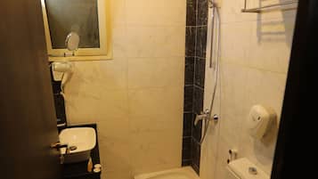 Basic Twin Room, 2 Queen Beds | Bathroom | Hair dryer, slippers, towels, soap