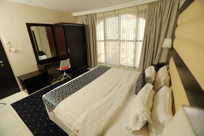 베이직 스위트 | 객실 내 금고, 암막 커튼, 방음 설비, 다리미/다리미판