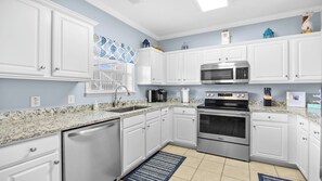 Fridge, microwave, dishwasher, coffee/tea maker - 1822 Ironwood - Barefoot Resort Rentals (North Myrtle Beach)