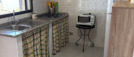 Microondas, horno y parrilla de estufa