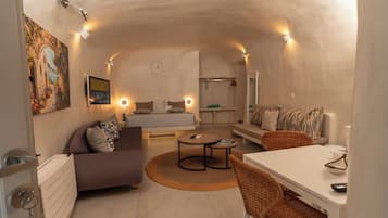 Deluxe suite, uitzicht op zee | Een kluis op de kamer, individueel gedecoreerd, individueel gemeubileerd