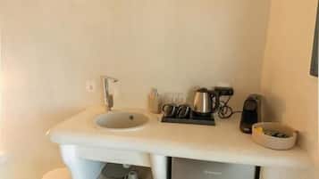 Suíte superior, vista para o mar | Cofres nos quartos, individualmente decorados