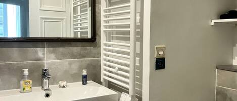 Hair dryer, towels, soap, toilet paper