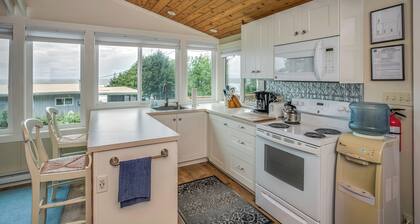 Enjoy the large deck with wooded ocean views.