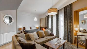 Luxury Suite, 1 King Bed with Sofa bed, Balcony, City View | Living area