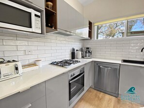 Fridge, microwave, oven, stovetop - Island Resort Retreat | Pools, Spa & Gym Access (Cowes)