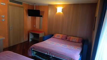 Superior Quadruple Room | In-room safe, desk, blackout drapes, soundproofing