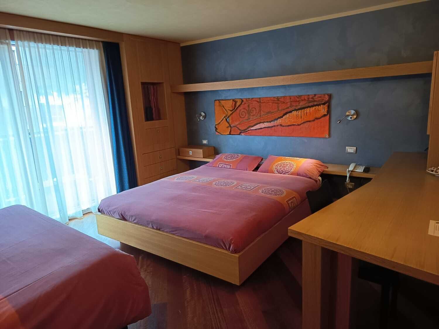 Superior Quadruple Room | In-room safe, desk, blackout drapes, soundproofing