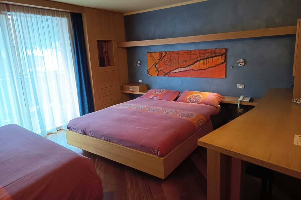 Superior Quadruple Room | In-room safe, desk, blackout curtains, soundproofing