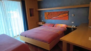 Superior Quadruple Room | In-room safe, desk, blackout drapes, soundproofing