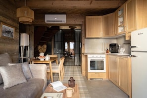 Deluxe Apartment, Balcony, City View | Living area - Zenya Krupówki 34c (Zakopane)