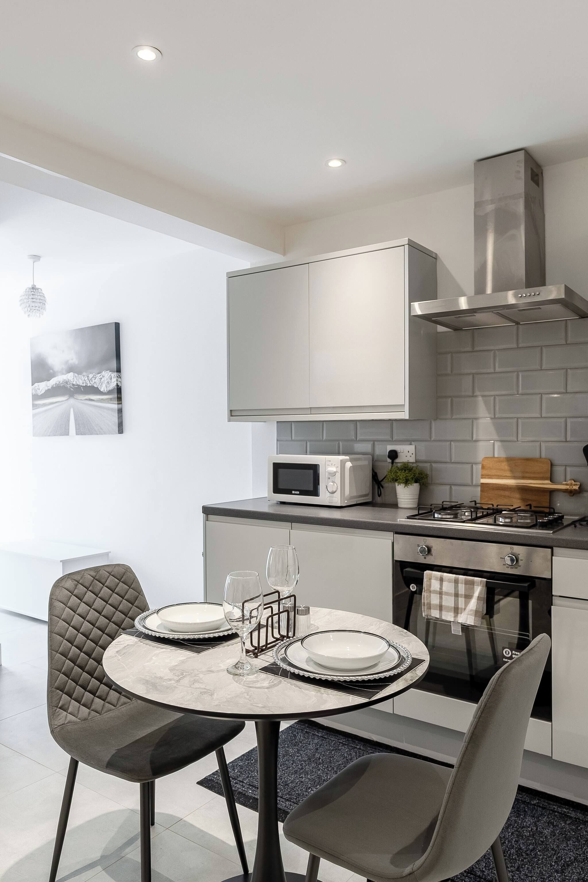 Apartamento, 2 quartos, para fumantes, vista para a cidade | Sala de jantar