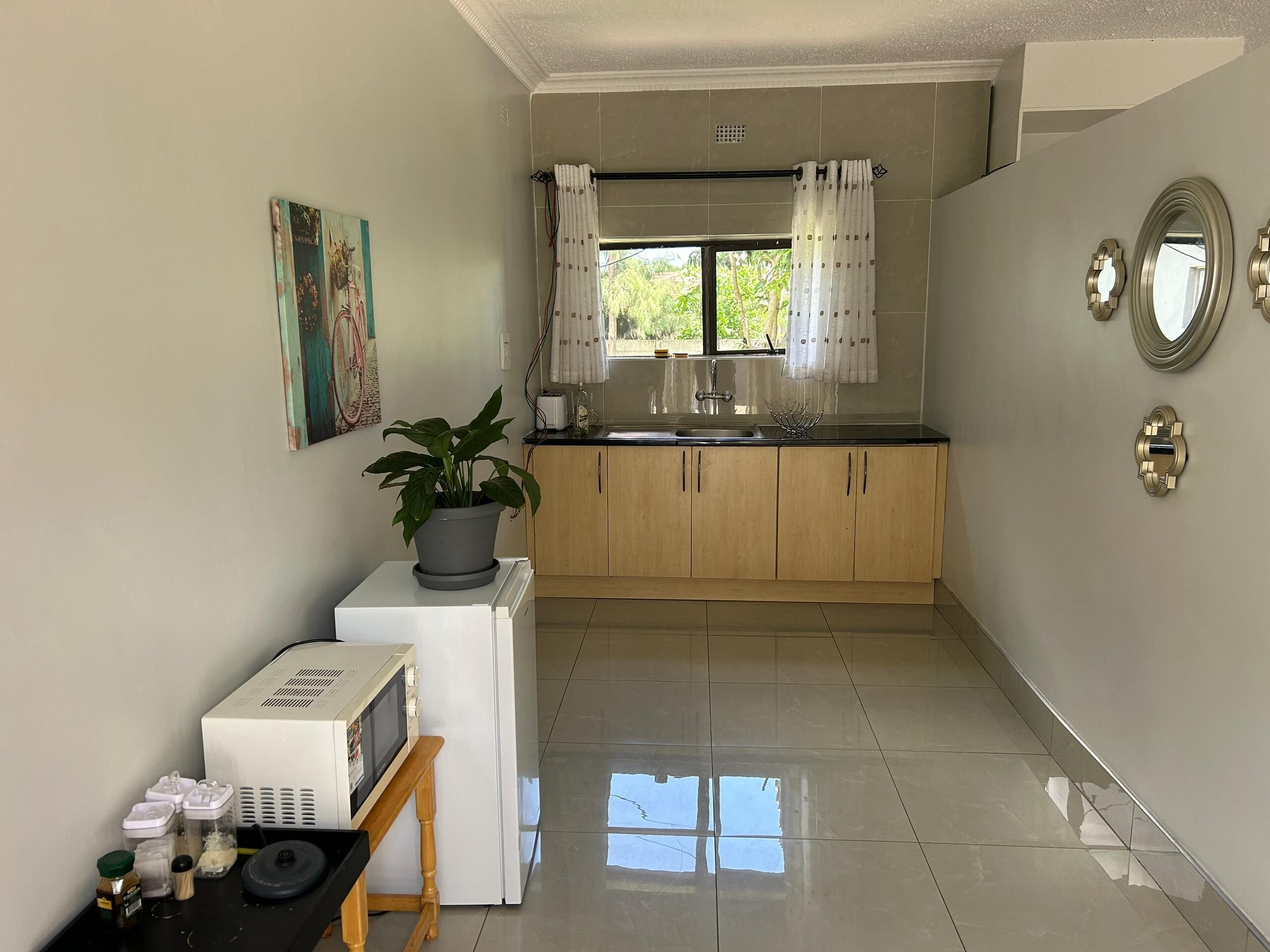 Fridge, microwave, cookware/dishes/utensils