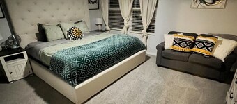 Spacious - family fun- Pet friendly-doggie door-fenced yard.