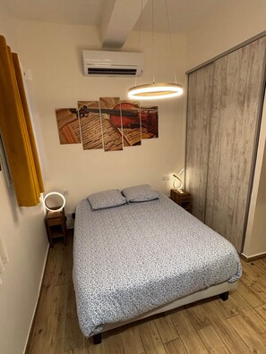 1 chambre, fer et planche à repasser, Wi-Fi gratuit, draps fournis