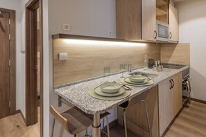 Appartement | Cuisine privée | Four, plaque de cuisson