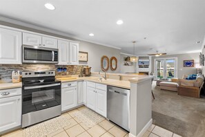 Fridge, microwave, oven, stovetop - Reel Nauti at Ocean Village by Seaside Vacations & Sales (Ocean City)
