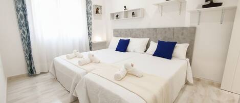 4 dormitorios, tabla de planchar con plancha, wifi gratis y ropa de cama