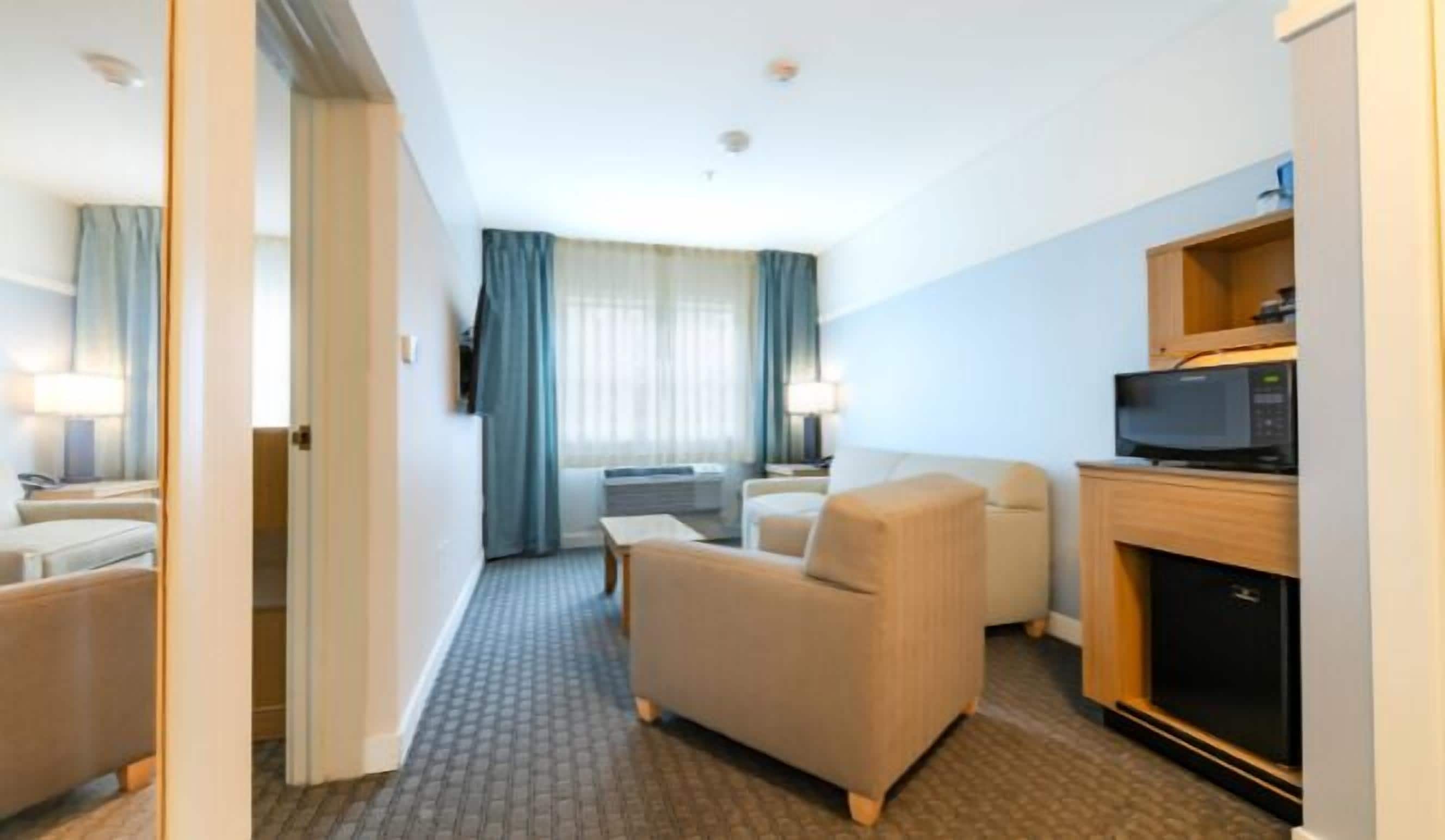 In-room safe, desk, laptop workspace, blackout curtains