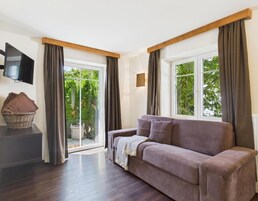 Family Apartment, Non Smoking | Living area | TV