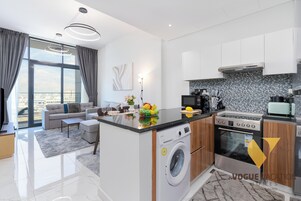 Luxury Apartment, Balcony, City View | Private kitchen | Full-size fridge, microwave, oven, stovetop