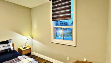 2 dormitorios, tabla de planchar con plancha, wifi gratis y ropa de cama