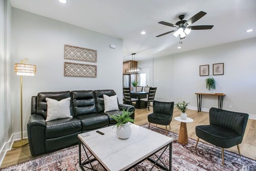 Stay at Sunrise is a golden retreat located one block from the river.