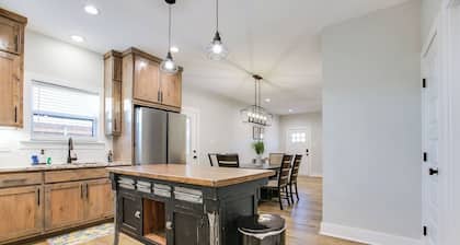 Stay at Sunrise is a golden retreat located one block from the river.