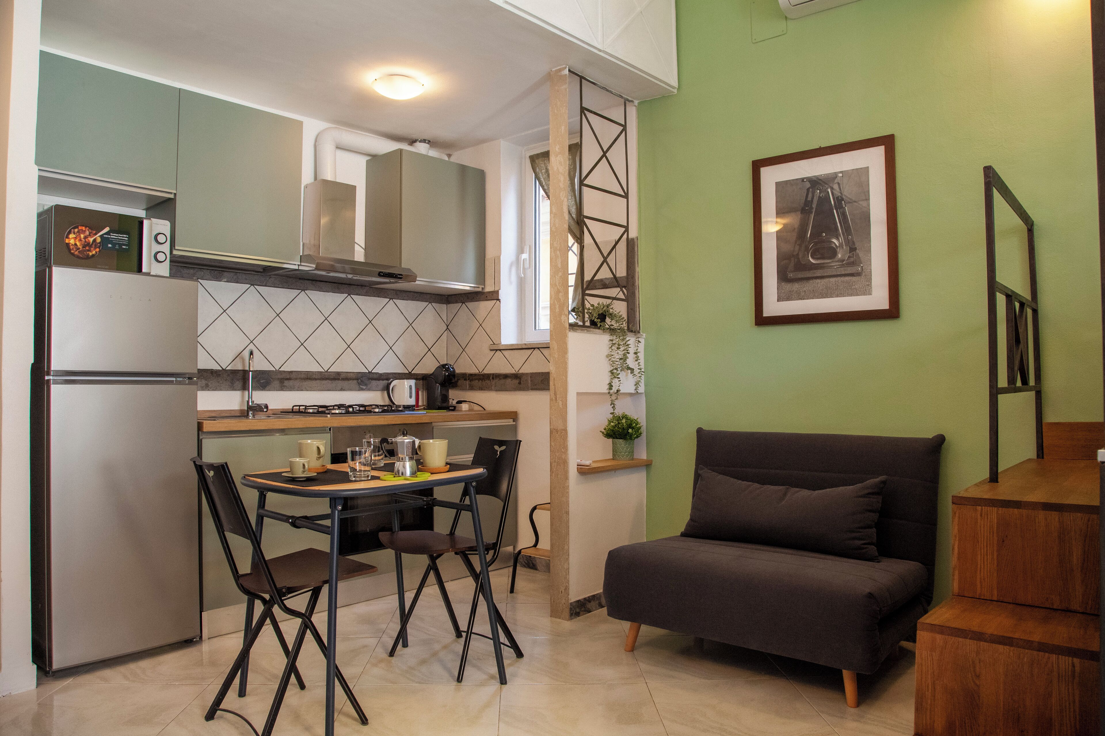 Studio (0 Bedroom) | Living area | 32-inch TV with cable channels