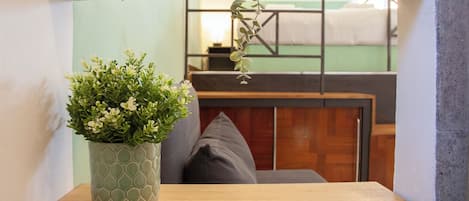 Studio (0 Bedroom) | Living area | 32-inch TV with cable channels