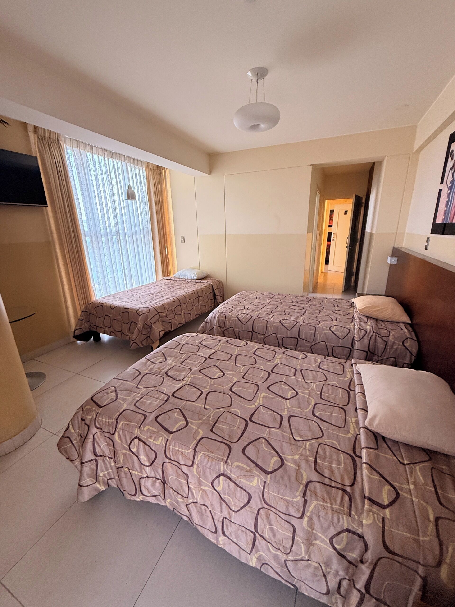 Family Triple Room, Multiple Beds, Private Bathroom, City View | Laptop workspace, free WiFi