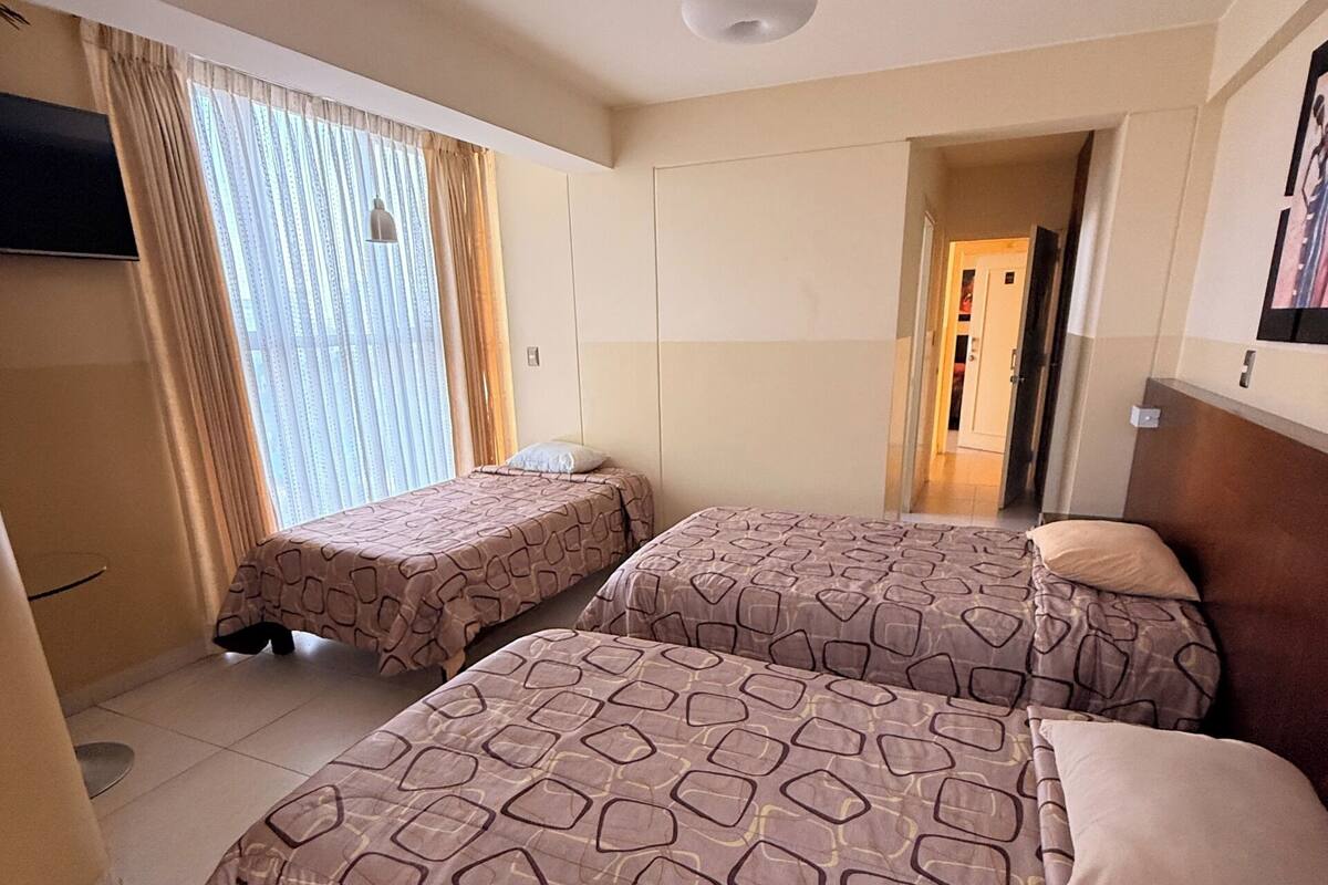 Family Triple Room, Multiple Beds, Private Bathroom, City View | Laptop workspace, free WiFi